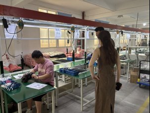 ONYX COOKWARE representatives observing the production workshop at Ningbo Weituo Electrical Technology