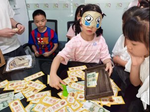 Children and parents enjoying interactive games during the Children's Day celebration at Ningbo Weituo